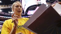 WNBA star Sophie Cunningham signing autographs with the Indiana Fever.