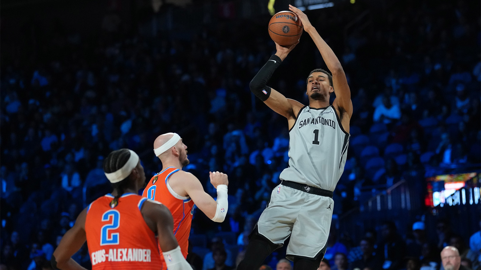 Spurs forward Victor Wembanyama (1) shoots the ball over Oklahoma City Thunder guard Alex Caruso (9) during the third quarter at T-Mobile Arena