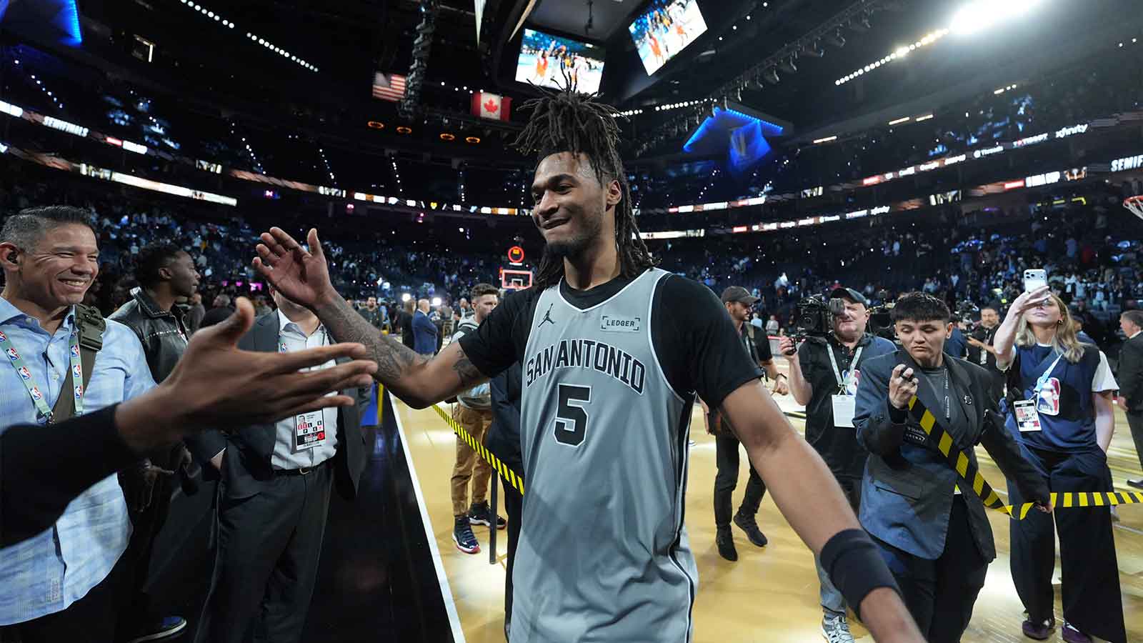 San Antonio Spurs guard Stephon Castle (5) celebrates after the game against the Oklahoma City Thunder at T-Mobile Arena.