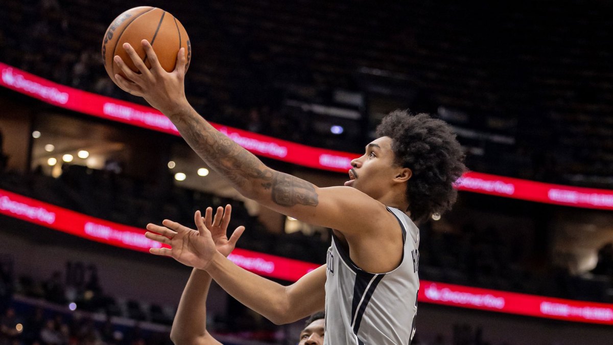 Spurs guard Dylan Harper (2) drives