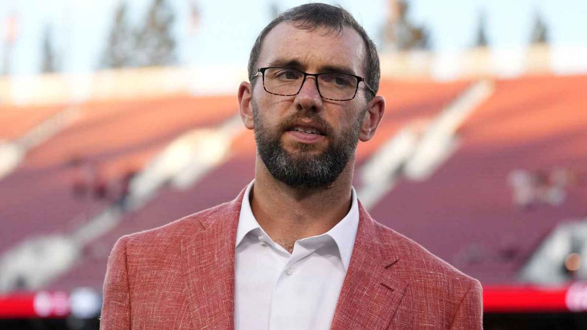 Stanford Cardinal general manager Andrew Luck stands on the field before the game against the Boston College Eagles at Stanford Stadium.