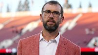 Stanford Cardinal general manager Andrew Luck stands on the field before the game against the Boston College Eagles at Stanford Stadium.