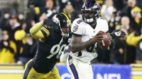 Pittsburgh Steelers outside linebacker T.J. Watt (90) pressures Baltimore Ravens quarterback Lamar Jackson (8) during the fourth quarter at Heinz Field. Pittsburgh won 20-19