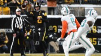 Pittsburgh Steelers quarterback Aaron Rodgers (8) throws in the first quarter against the Miami Dolphins at Acrisure Stadium. Mandatory Credit: Barry Reeger-Imagn Images
