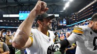 Pittsburgh Steelers quarterback Aaron Rodgers (8) celebrates after their win against the Detroit Lions at Ford Field.