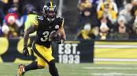 Pittsburgh Steelers running back Jaylen Warren (30) rushes during the first quarter against the Buffalo Bills at Acrisure Stadium.