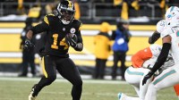 Pittsburgh Steelers running back Kenneth Gainwell (14) runs during the third quarter against the Miami Dolphins at Acrisure Stadium.