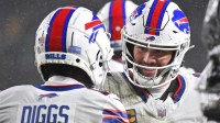 New England Patriots wide receiver Stefon Diggs and Josh Allen while teammates on the Buffalo Bills.