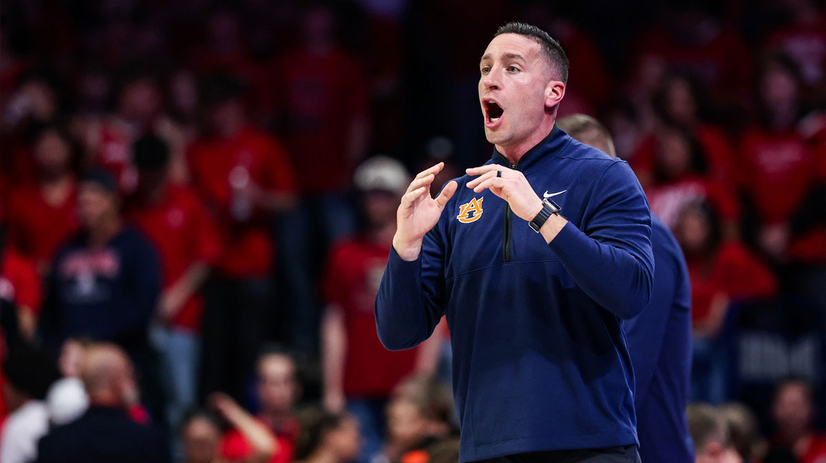 Auburn Tigers head coach Steven Pearl yells out to players during the first half of the game against the Arizona Wildcats at McKale Memorial Center.
