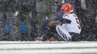 Cincinnati Bengals wide receiver Tee Higgins (5) waits for trainers after hitting his head on the ground on a catch in the second quarter of the NFL Week 14 game between the Buffalo Bills and the Cincinnati Bengals at Highmark Stadium