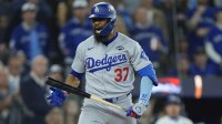 Los Angeles Dodgers right fielder Teoscar Hernandez (37) reacts after walking against the Toronto Blue Jays in the tenth inning during game seven of the 2025 MLB World Series at Rogers Centre
