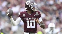 Texas A&M Aggies quarterback Marcel Reed (10) throws a pass against the Miami Hurricanes during first half of the first round game of the CFP National Playoff at Kyle Field.