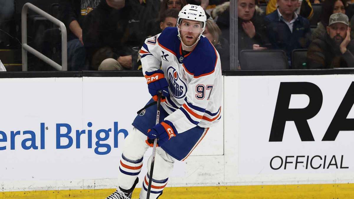 Edmonton Oilers center Connor McDavid (97) carries the puck against the Boston Bruins during the third period at TD Garden.