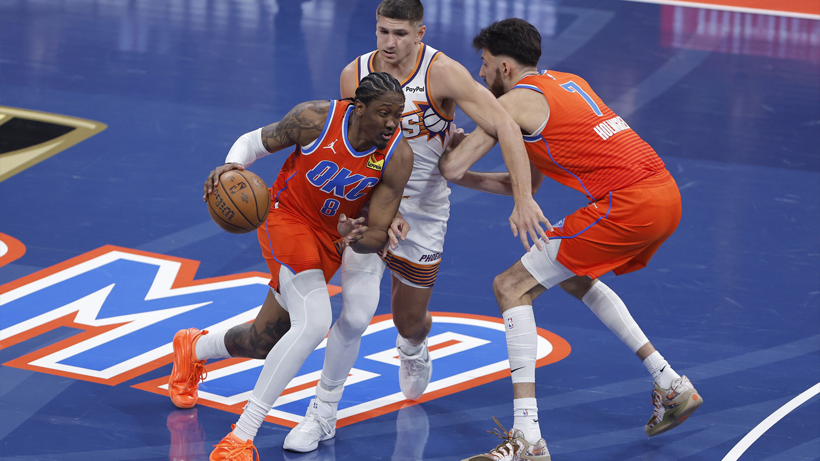 Thunder guard Jalen Williams (8) drives past Phoenix Suns guard Grayson Allen (8) during the first quarter at Paycom Center