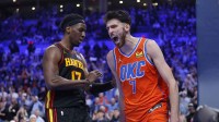 Thunder center Chet Holmgren (7) screams next to Atlanta Hawks forward Onyeka Okongwu (17) after dunking against the Atlanta Hawks during the second half at Paycom Center