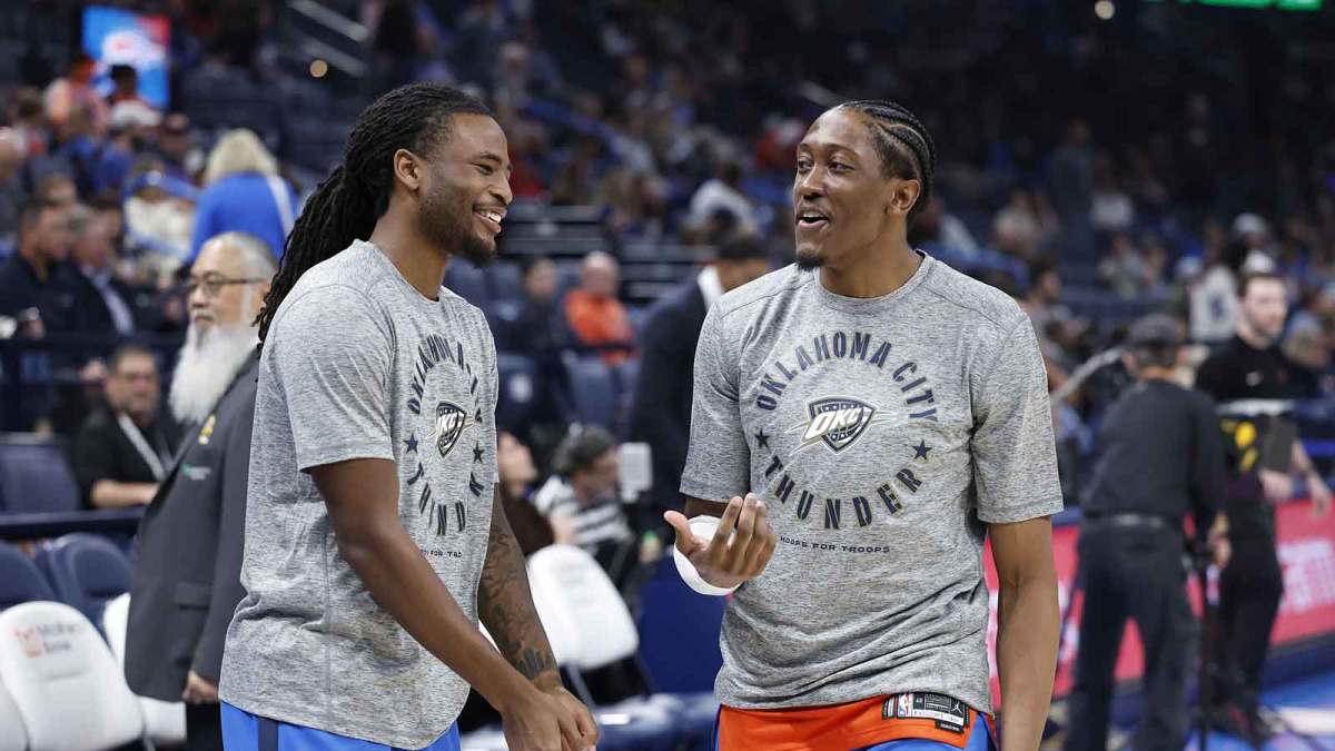 Thunder guard Cason Wallace (22) and forward Jalen Williams (8) before the start of a game against the Houston Rockets at Paycom Center