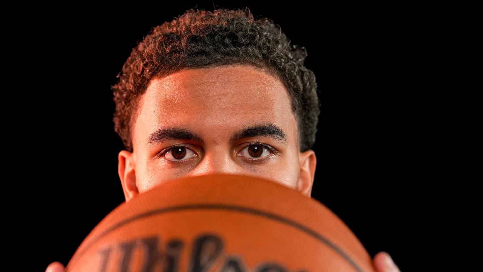Oklahoma guard Ajay Mitchell (25) poses for a photo shoot during Thunder media day at Paycom Center in Oklahoma City on Monday, Sept. 29, 2025.