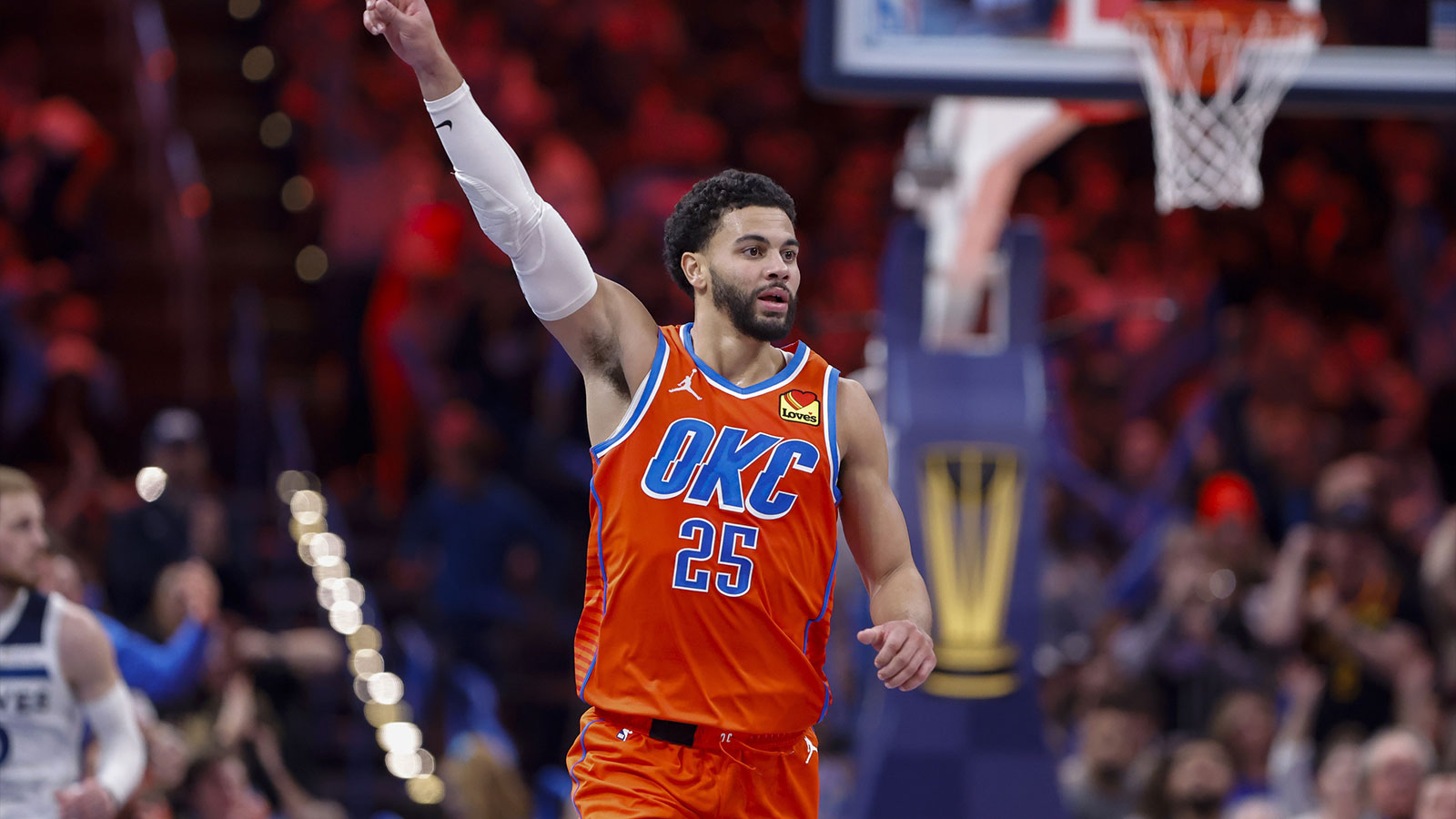 Thunder guard Ajay Mitchell (25) gestures to his team during a play against the Minnesota Timberwolves during the second half at Paycom Center