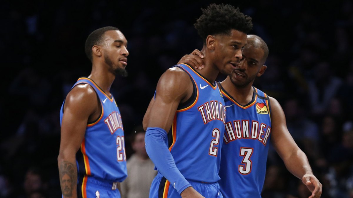 Thunder guard Shai Gilgeous-Alexander (2) and Oklahoma City Thunder guard Chris Paul (3) react in overtime against the Brooklyn Nets at Barclays Center