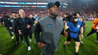 UCLA Bruins interim coach Tim Skipper leaves the field after the game against the Southern California Trojans at United Airlines Field at Los Angeles Memorial Coliseum.