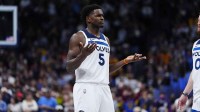 Minnesota Timberwolves guard Anthony Edwards (5) reacts to a flagrant foul called in overtime against the against the Denver Nuggets at Ball Arena.