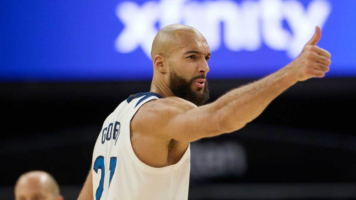 Timberwolves' Rudy Gobert dunks over Warriors' Pat Spencer as the Anthony Edwards-less Minnesota defeated Golden State, 127-120.