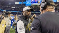 Pittsburgh Steelers head coach Mike Tomlin and Detroit Lions head coach Dan Campbell meet after the game at Ford Field