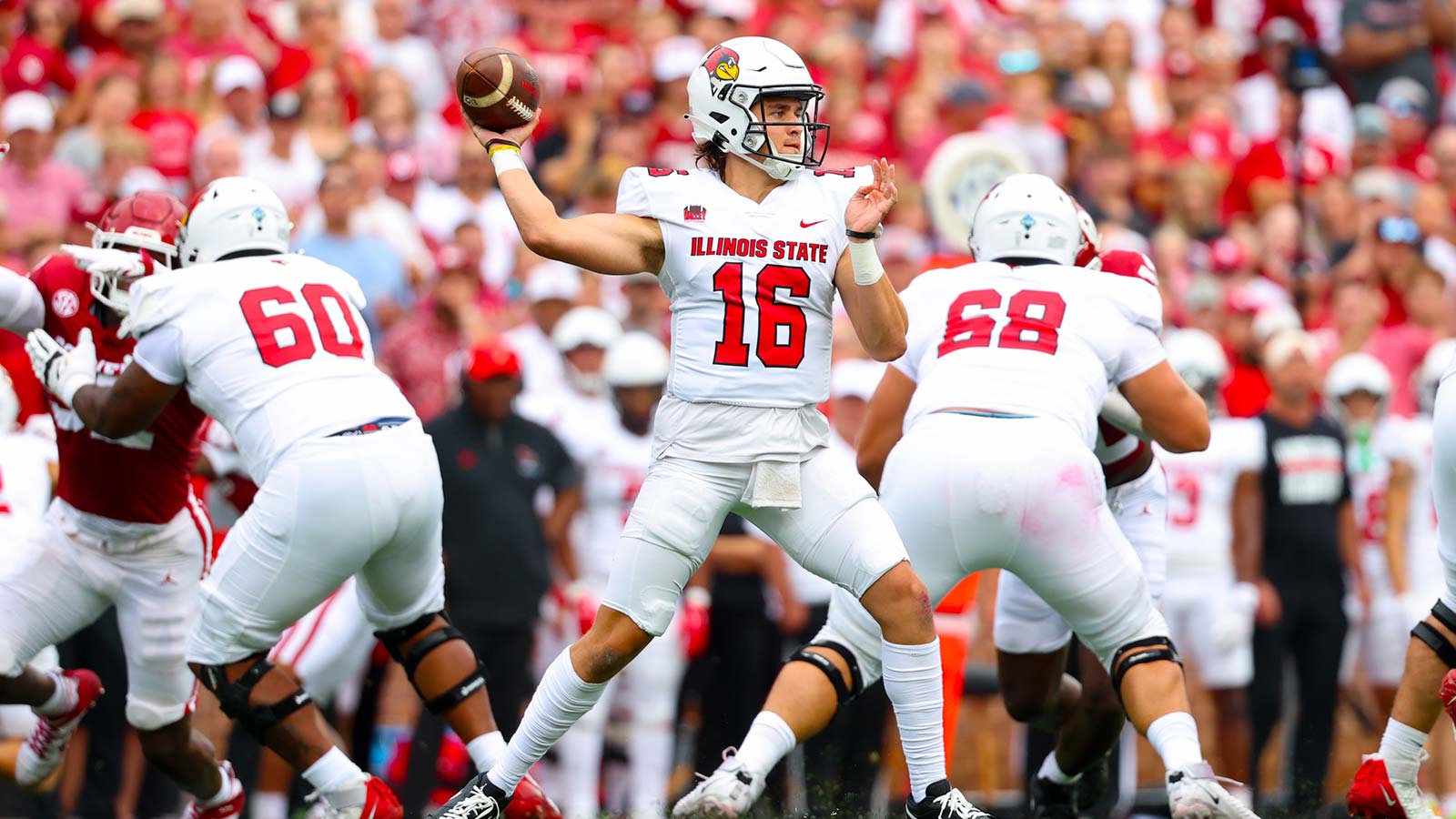 Illinois State Redbirds quarterback Tommy Rittenhouse (16) throws against the Oklahoma Sooners during the first half at Gaylord Family-Oklahoma Memorial Stadium.