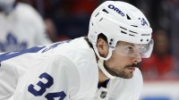 Toronto Maple Leafs center Auston Matthews (34) lines up for a face-off against the Washington Capitals during the first period at Capital One Arena.