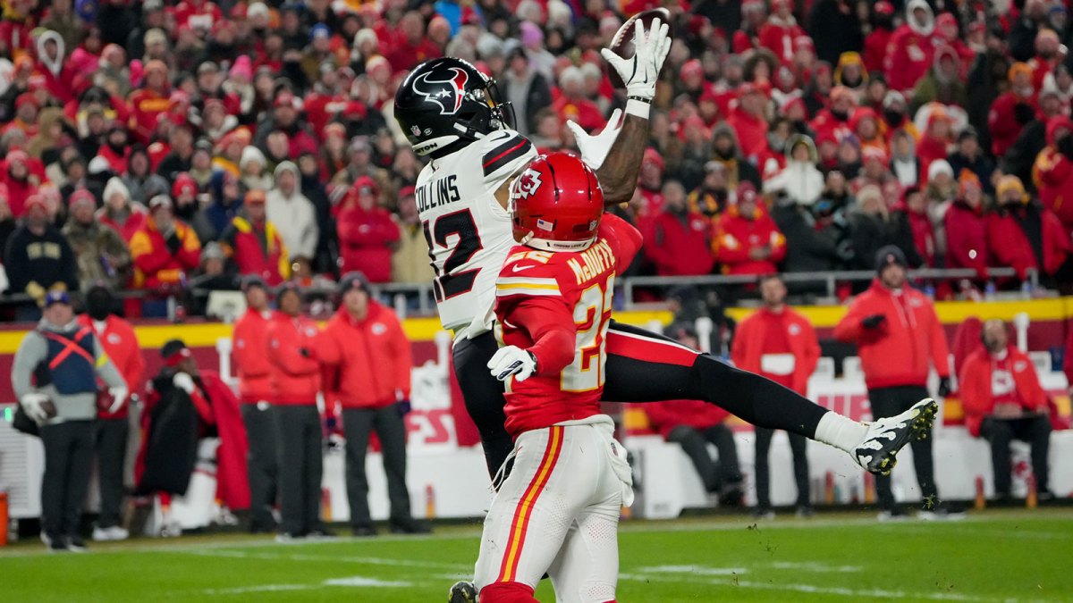 Houston Texans wide receiver Nico Collins (12) catches a pass against Kansas City Chiefs cornerback Trent McDuffie (22) during the first quarter at GEHA Field at Arrowhead Stadium.