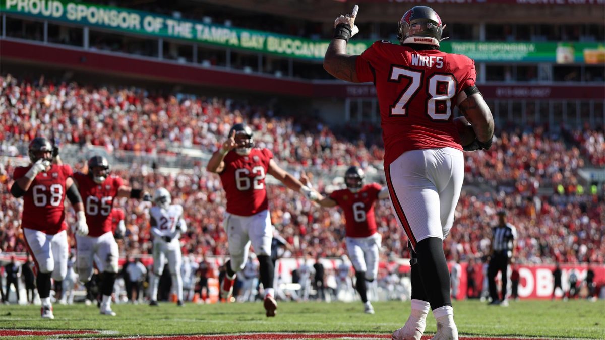 Tampa Bay Buccaneers offensive tackle Tristan Wirfs (78) celebrates with teammates after scoring a touchdown during the first half against the Arizona Cardinals at Raymond James Stadium.