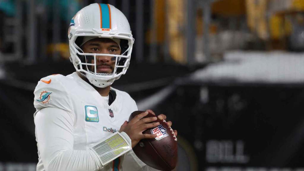 Miami Dolphins quarterback Tua Tagovailoa (1) warm ups prior to the game against the Pittsburgh Steelers at Acrisure Stadium.