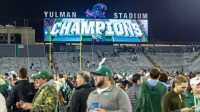 Tulane Green Wave fans get ready to storm the field in the final minutes against the North Texas Mean Green during the second half in the 2025 American Championship at Yulman Stadium.