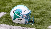 Tulane Green Wave helmet on the field against the UCF Knights during the first half at Yulman Stadium.
