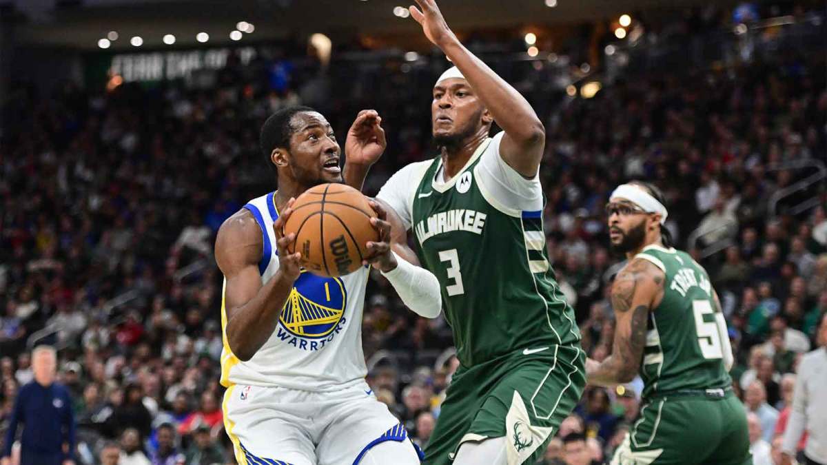 Golden State Warriors forward Jonathan Kuminga (1) looks for a shot against Milwaukee Bucks center Myles Turner (3) in the second quarter at Fiserv Forum