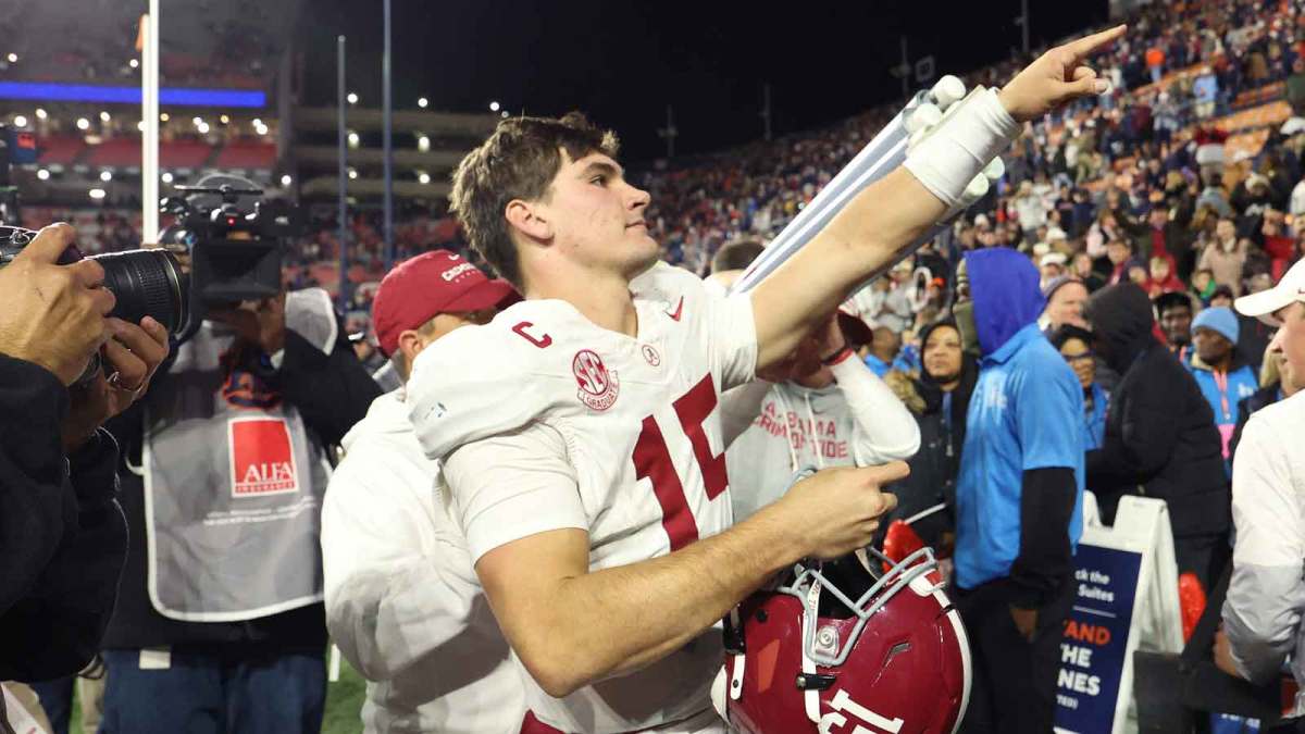 Alabama Crimson Tide quarterback Ty Simpson (15) reacts after the game against the Auburn Tigers at Jordan-Hare Stadium.