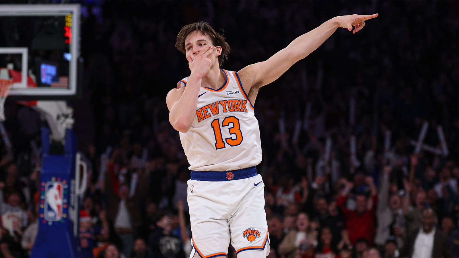 New York Knicks guard Tyler Kolek (13) reacts after making a three point basket during the second half against the Cleveland Cavaliers at Madison Square Garden. Mandatory Credit: Vincent Carchietta-Imagn Images