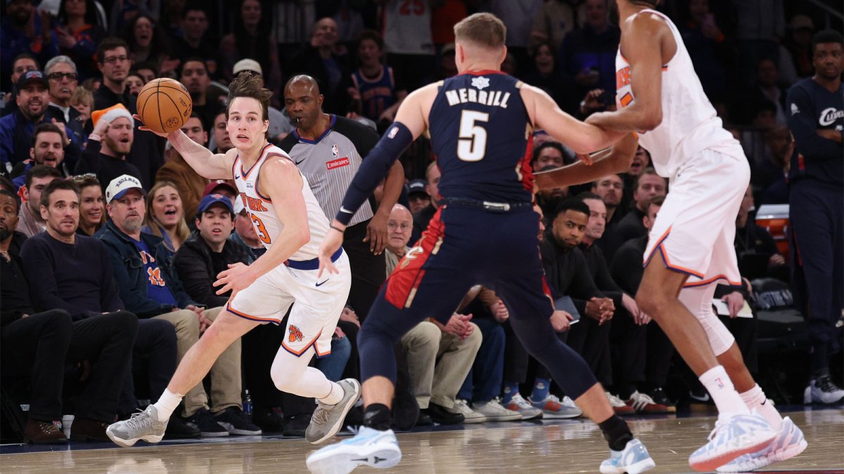 New York Knicks guard Tyler Kolek (13) secures the ball after a steal during the second half against the Cleveland Cavaliers at Madison Square Garden.