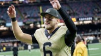New Orleans Saints quarterback Tyler Shough (6) smiles as he leaves the field after a game against the New York Jets at Caesars Superdome.