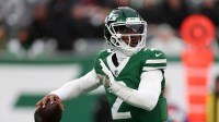 New York Jets quarterback Tyrod Taylor (2) drops back to pass against the Atlanta Falcons during the first half at MetLife Stadium.