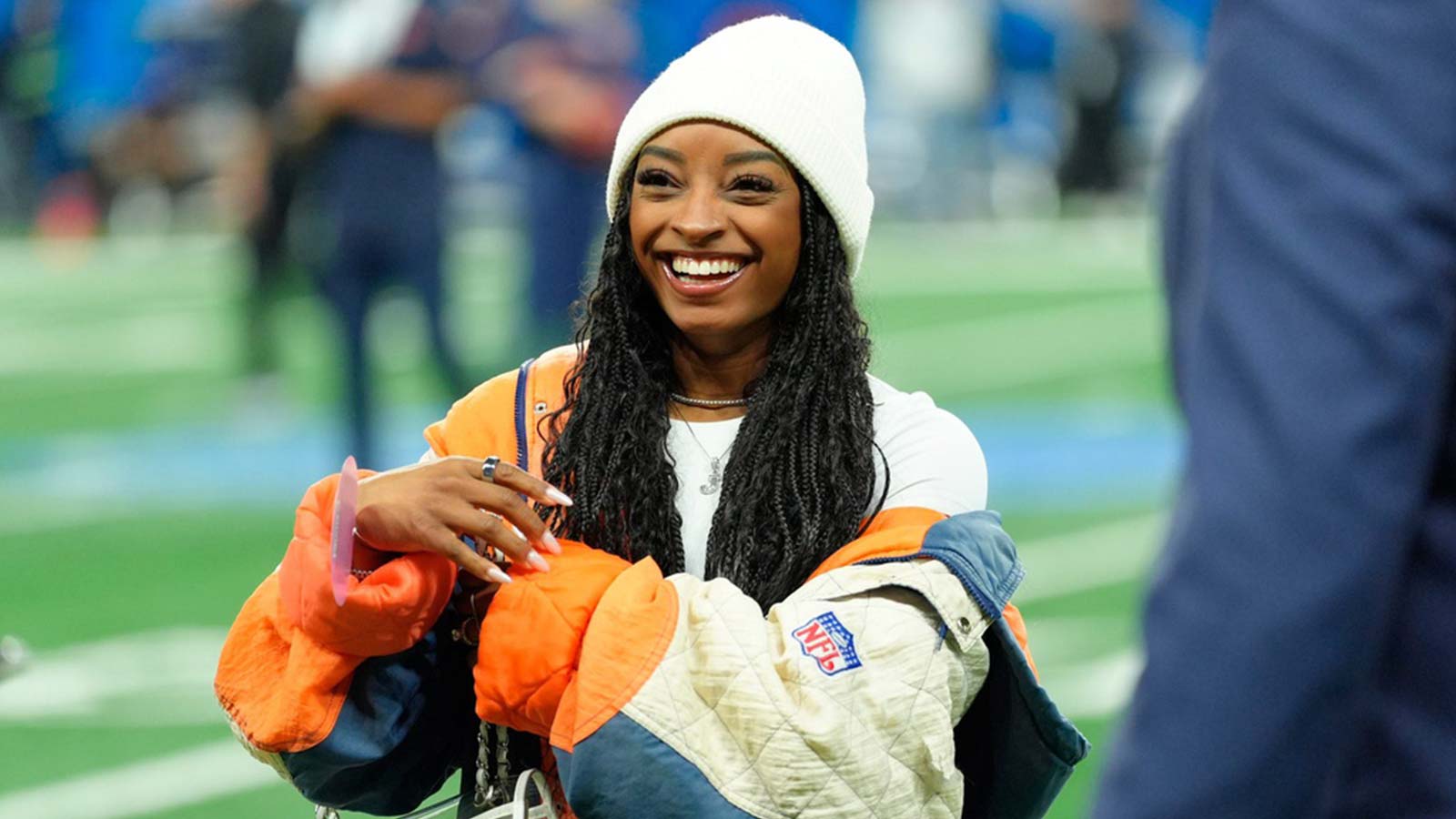 Simone Biles reacts to Chicago Bears overtime win