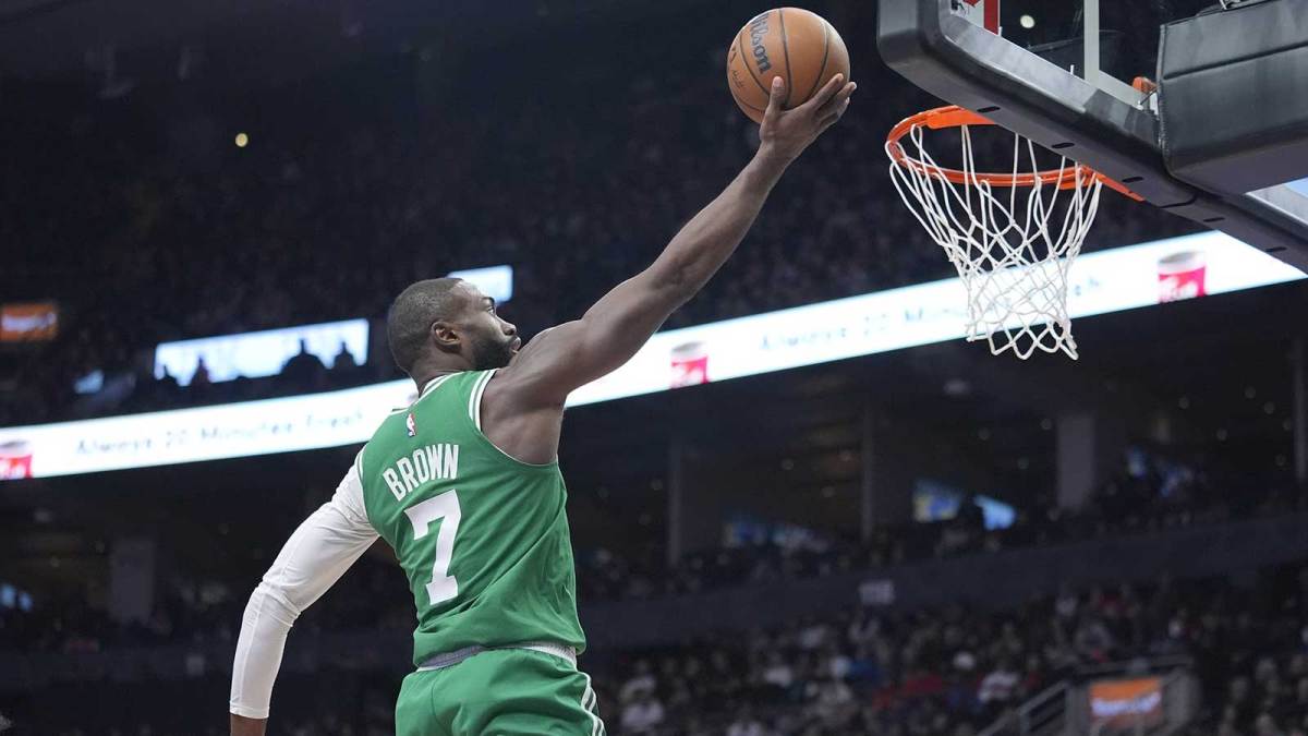 Boston Celtics forward Jaylen Brown (7) goes up to make a basket against the Toronto Raptors during the first half at Scotiabank Arena.