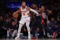 New York Knicks guard Jalen Brunson (11) is guarded by Cleveland Cavaliers guard Donovan Mitchell (45) during the first half at Madison Square Garden.