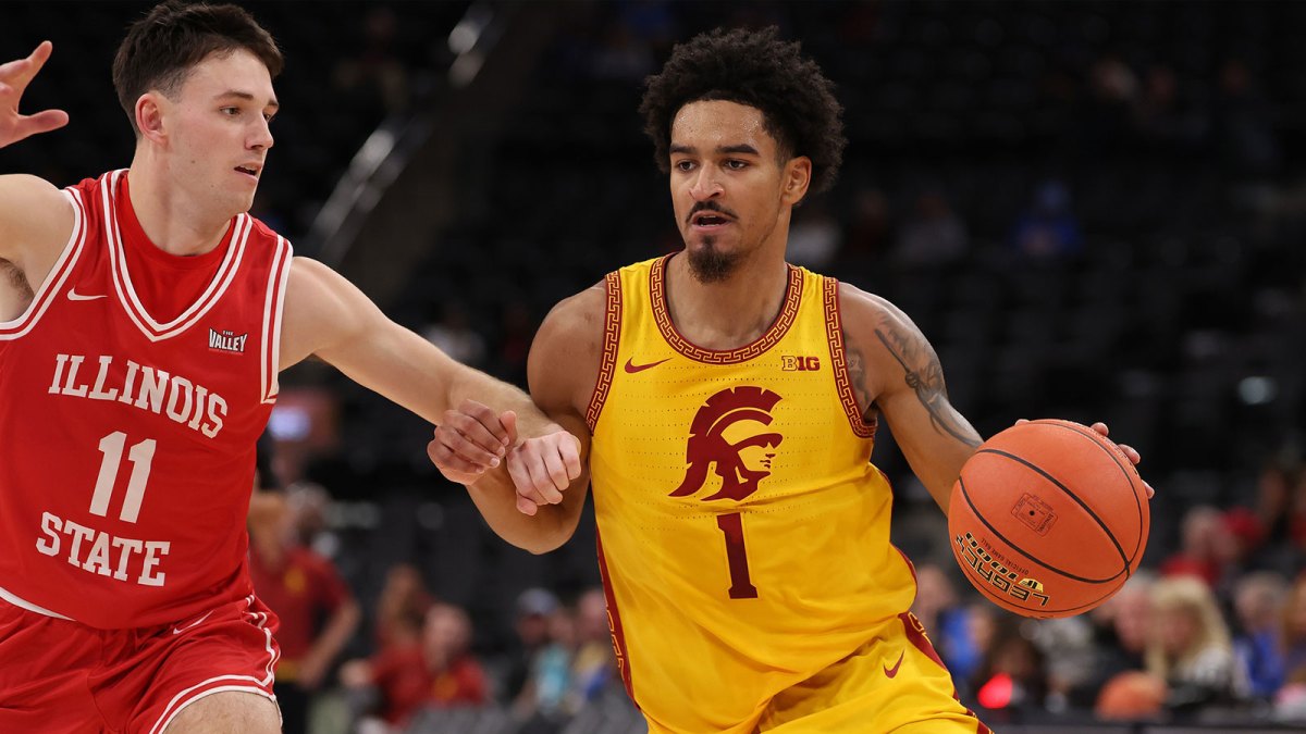 Southern California Trojans guard Rodney Rice (1) dribbles the ball against Illinois State Redbirds guard Johnny Kinziger (11) during the first half of the Hall of Fame Series game at Intuit Dome.