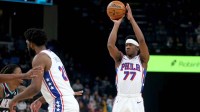 Philadelphia 76ers guard VJ Edgecombe (77) shoots during the first quarter against the Memphis Grizzlies at FedExForum.