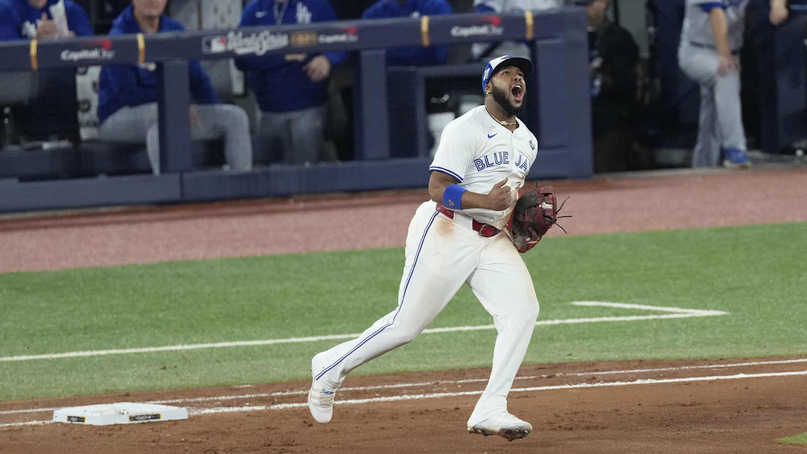 Toronto Blue Jays first baseman Vladimir Guerrero Jr. (27) reacts after a double play against the Los Angeles Dodgers in the seventh inning during game seven of the 2025 MLB World Series at Rogers Centre.