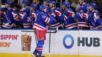 New York Rangers defenseman Vladislav Gavrikov (44) celebrates his goal against the Nashville Predators with teammates during the first period at Madison Square Garden.