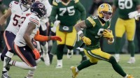 Green Bay Packers wide receiver Christian Watson (9) makes a reception for a first down during the first quarter of their game against the Chicago Bears Sunday, December 7, 2025 at Lambeau Field in Green Bay, Wisconsin.
