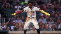 Atlanta Braves right fielder Ronald Acuna Jr. (13) celebrates after scoring a run against the San Francisco Giants in the fourth inning at Truist Park.