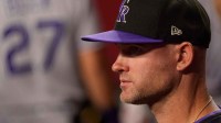 Colorado Rockies interim manager Warren Schaeffer (32) watches on from the dugout during the first inning inning against the Arizona Diamondbacks at Chase Field.